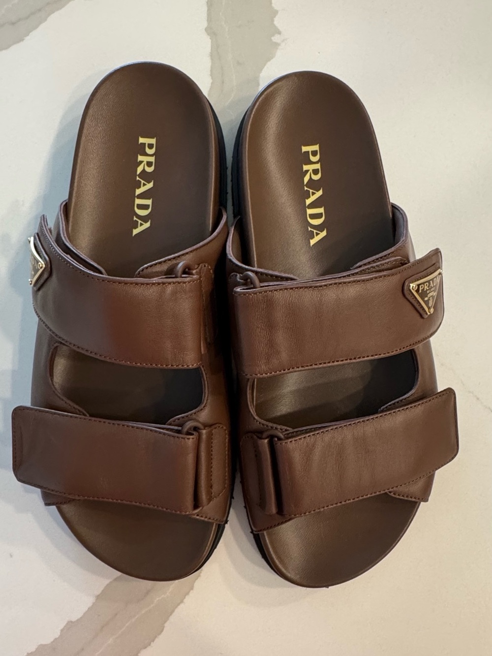 Women’s Luxury Prada Brown Leather Dual-Strap Slide Sandal with Gold Logo - Picture 12 of 14